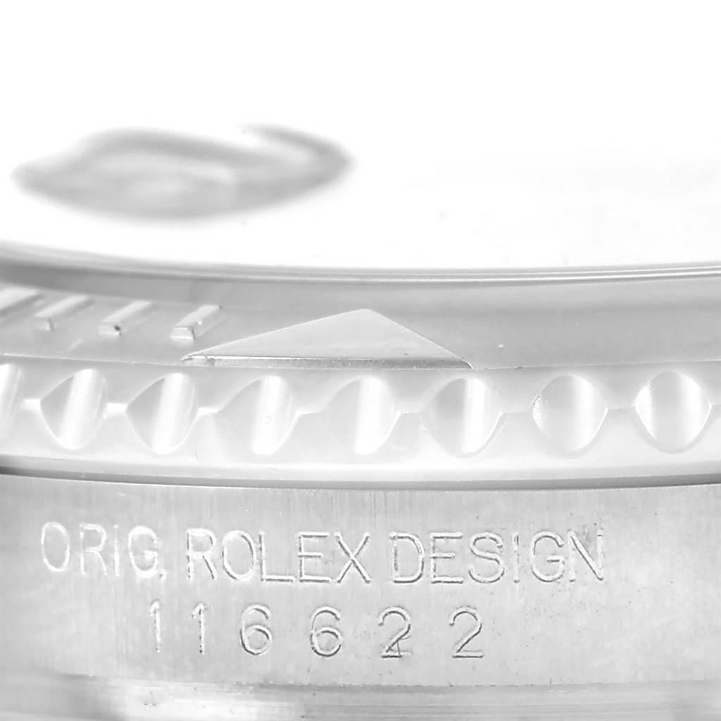 This close-up image of the Rolex Submariner 116622 Men
s Stainless Steel Silver Dial 116622 Men
s Stainless Steel Silver Dial shows the bezel edge and engraved model number 116622.