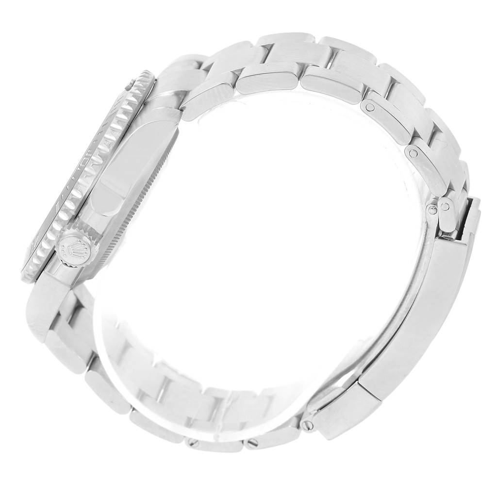 The image shows a side view of a Rolex Submariner 114060 Men
s Stainless Steel Black Dial 114060 Men
s Stainless Steel Black Dial
s case and its metal bracelet.