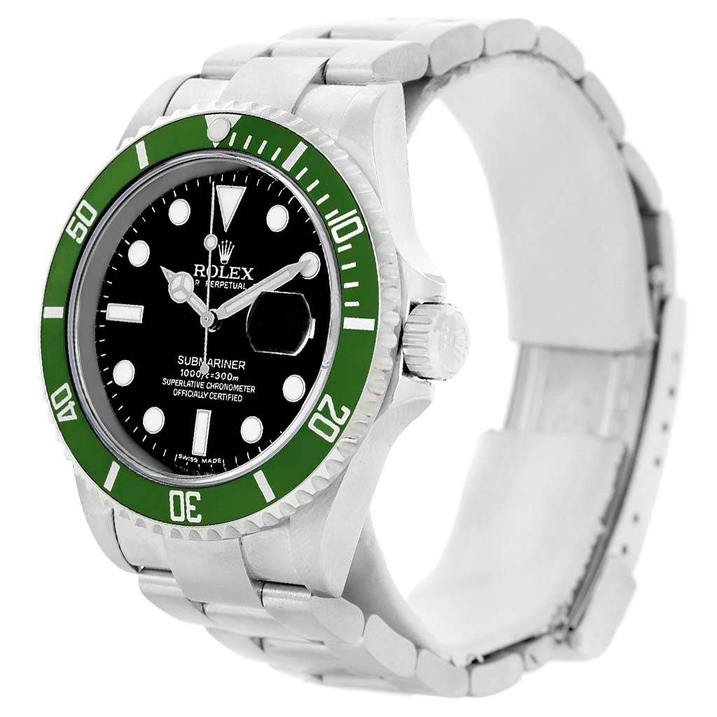 The image shows a Rolex Submariner 16610LV Men
s Stainless Steel Black Dial 16610LV Men
s Stainless Steel Black Dial watch at an angled view featuring its green bezel, black dial, and metal bracelet.