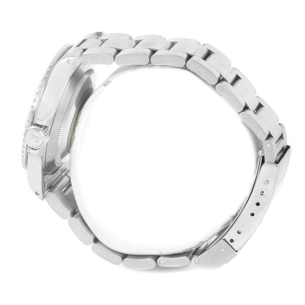 This image shows a side profile of the Rolex Submariner 14060 Men
s Stainless Steel Black Dial 14060 Men
s Stainless Steel Black Dial watch, highlighting its bracelet, crown, and side case.