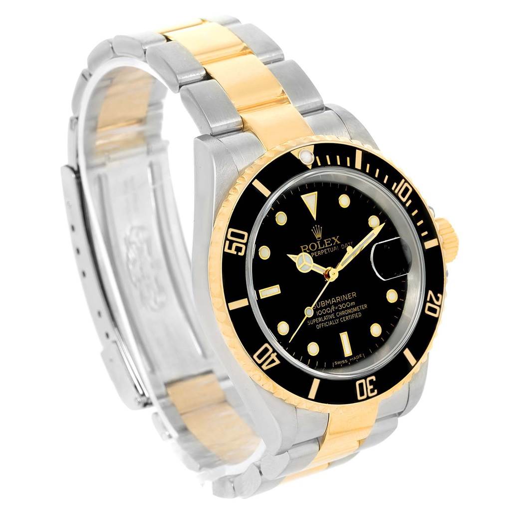 This image shows a Rolex Submariner 16613 Men's Steel and Gold (two tone) Black Dial 16613 Men's Steel and Gold (two tone) Black Dial watch at a three-quarter angle, highlighting the bezel, dial, and two-tone bracelet.