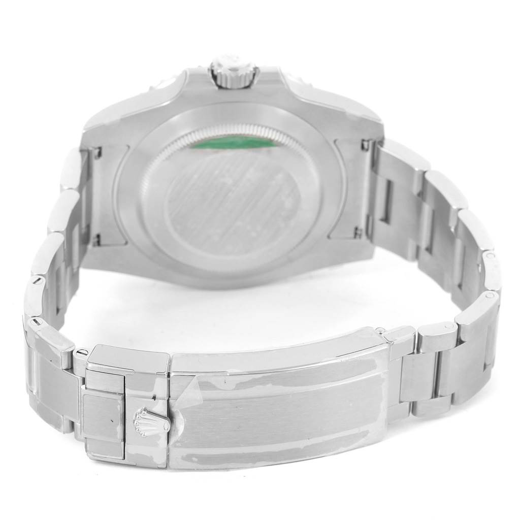 The image shows the back case, clasp, and part of the bracelet of a Rolex Submariner 116610 Men
s Stainless Steel Black Dial 116610 Men
s Stainless Steel Black Dial watch in a rear view angle.