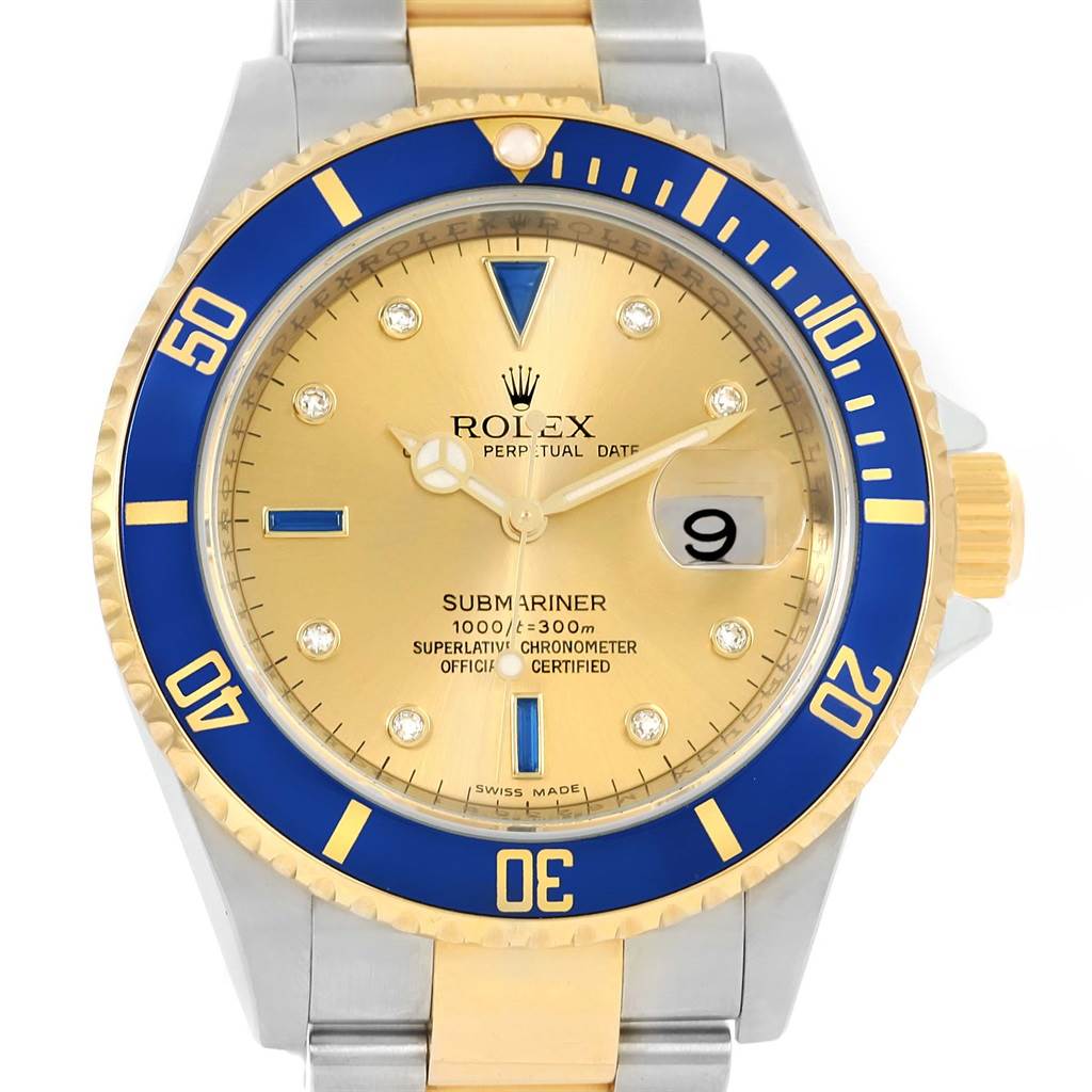 The image shows a front view of a Rolex Submariner 16613 Men's Steel and Gold (two tone) Champagne Dial 16613 Men's Steel and Gold (two tone) Champagne Dial watch, highlighting the dial, bezel, and part of the bracelet.