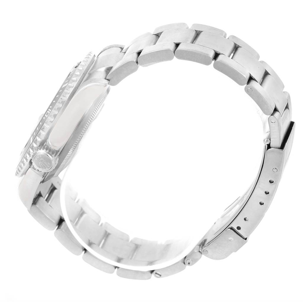 The image shows a side view of the Rolex Submariner 16610LV Men's Stainless Steel Black Dial 16610LV Men's Stainless Steel Black Dial watch, highlighting the bracelet, clasp, and case.