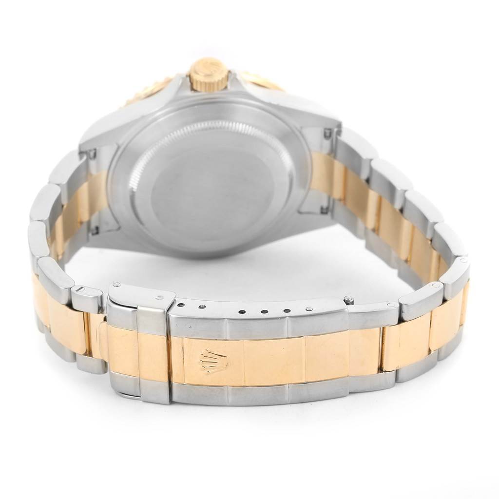 This image displays the Rolex Submariner 16613 Men's Steel and Gold (two tone) Blue Dial 16613 Men's Steel and Gold (two tone) Blue Dial watch from the back, highlighting its case and two-tone bracelet.