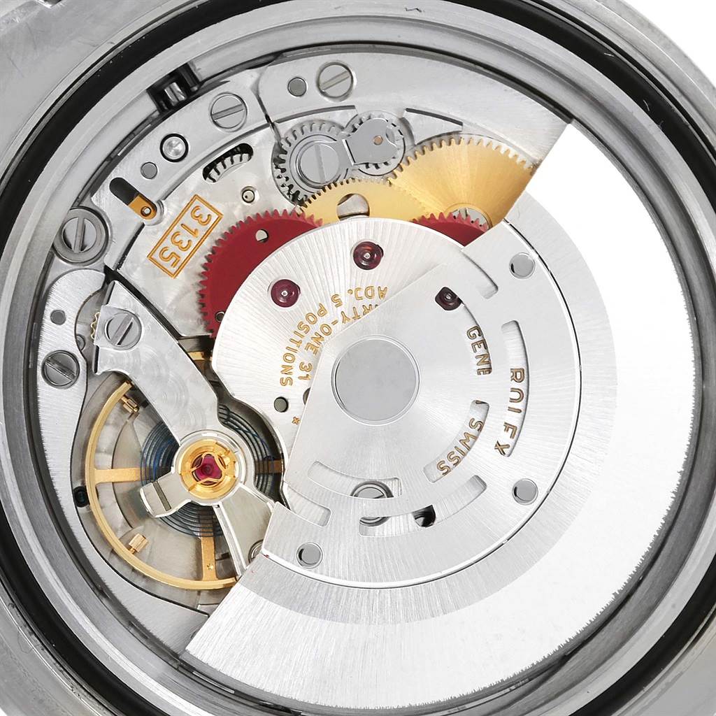 The image shows the intricate internal movement of a Rolex Submariner 116610 Men's Stainless Steel Black Dial 116610 Men's Stainless Steel Black Dial watch, viewed from the back.