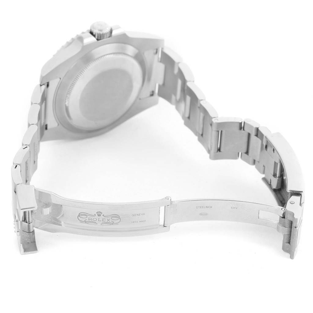 This image shows the back, clasp, and bracelet of a Rolex Submariner 116610LV Men's Stainless Steel Green Dial 116610LV Men's Stainless Steel Green Dial watch at an angled side view.