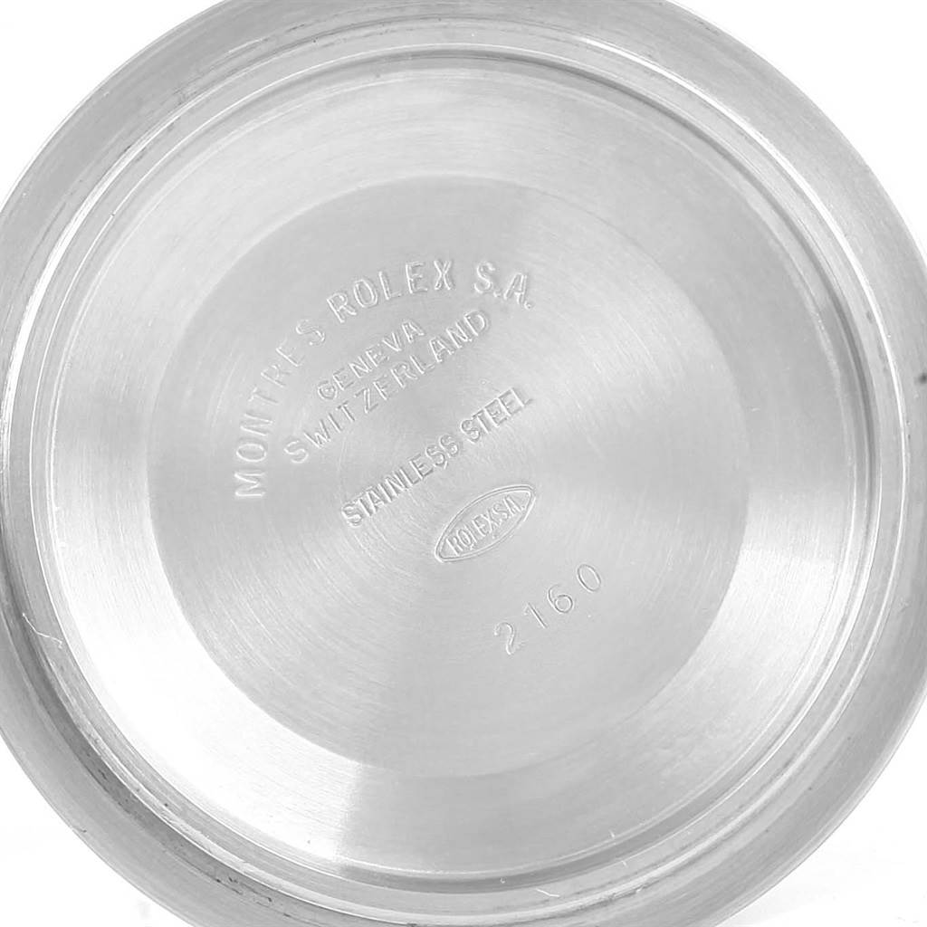 This image shows the inside of the case back of a Rolex Submariner 16610 Men's Stainless Steel Black Dial 16610 Men's Stainless Steel Black Dial watch, highlighting the engraved details.