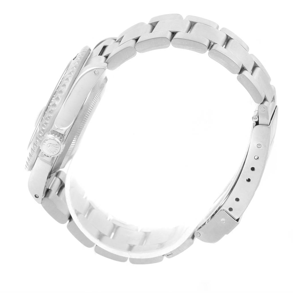 This image shows a side view of the Rolex Submariner 16610 Men's Stainless Steel Black Dial 16610 Men's Stainless Steel Black Dial watch, focusing on the bracelet and crown.