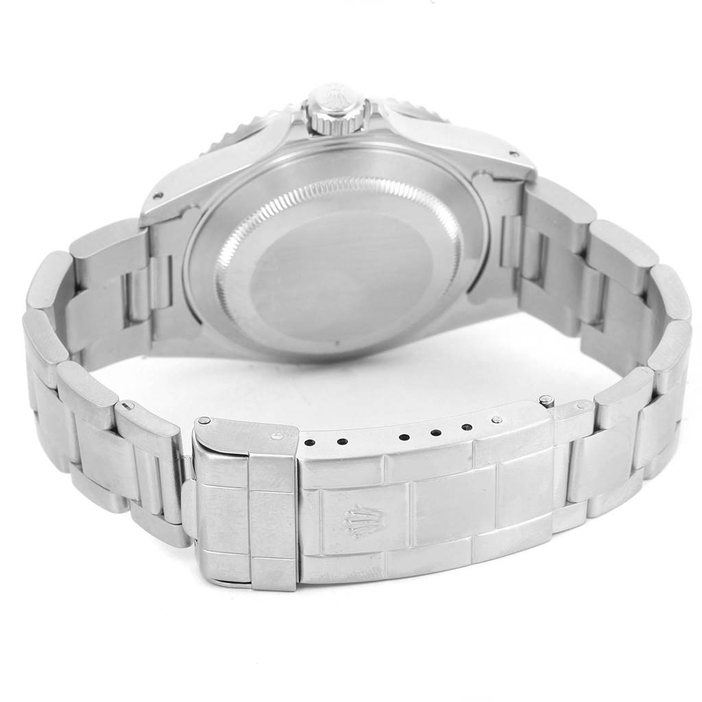 The image shows the back view of a Rolex Submariner 16610 Men's Stainless Steel Black Dial 16610 Men's Stainless Steel Black Dial watch, featuring its case back and bracelet with the clasp open.