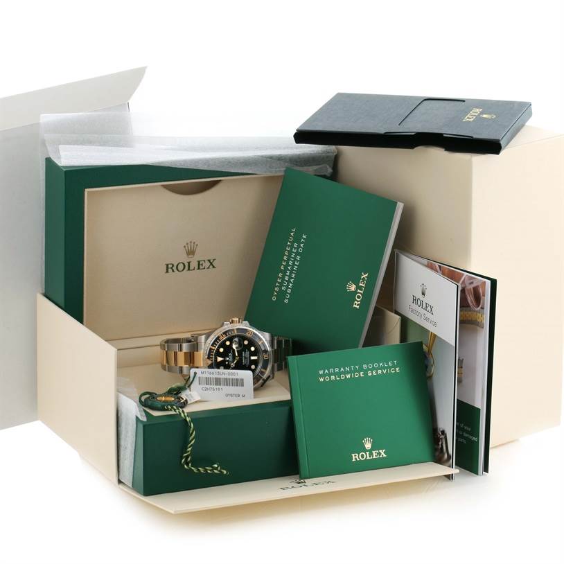 This image shows the Rolex Submariner 116613LN Men's Steel and Gold (two tone) Black Dial 116613LN Men's Steel and Gold (two tone) Black Dial watch from a front angle, including its box, warranty booklet, and other documentation.