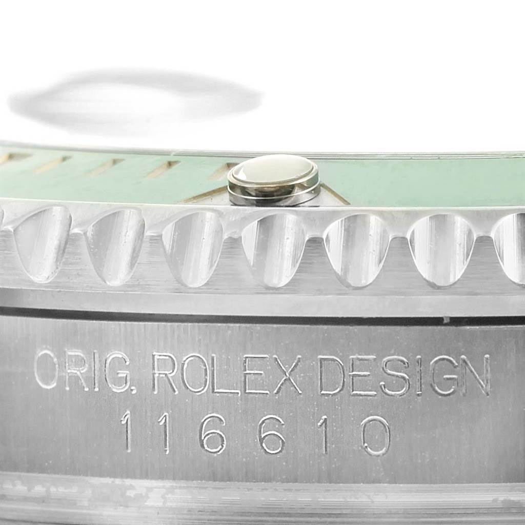 This image shows a close-up of the bezel and case side of a Rolex Submariner 116610LV Men's Stainless Steel Green Dial 116610LV Men's Stainless Steel Green Dial, featuring the model number 116610.