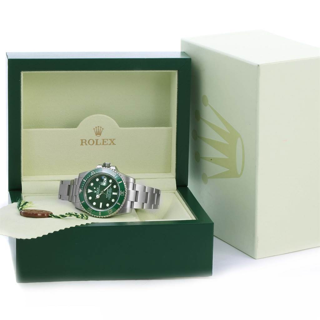 The image shows a Rolex Submariner 116610LV Men's Stainless Steel Green Dial 116610LV Men's Stainless Steel Green Dial watch in a green and beige branded box, viewed from the front.