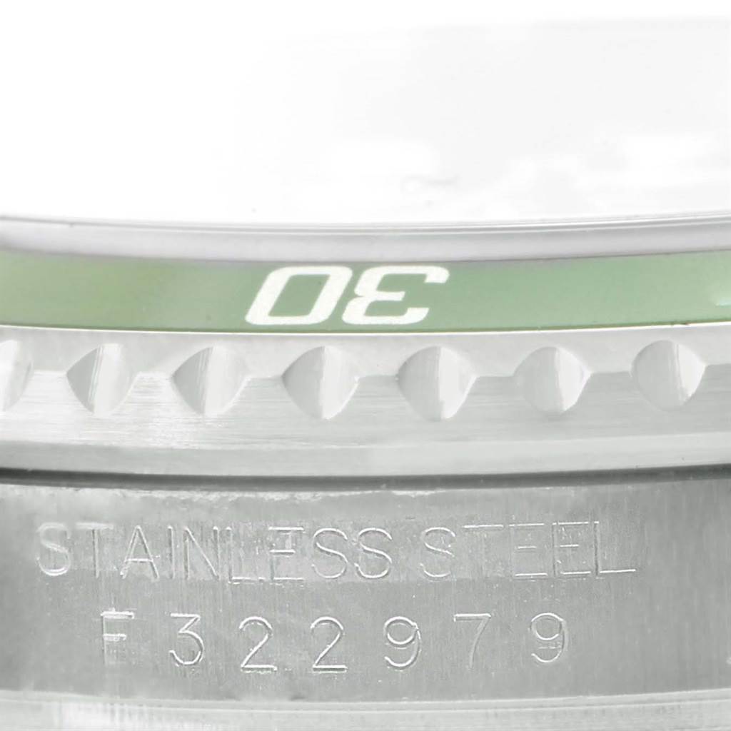 The image shows a close-up of the bezel and stainless steel case of a Rolex Submariner 16610LV Men's Stainless Steel Black Dial 16610LV Men's Stainless Steel Black Dial watch.