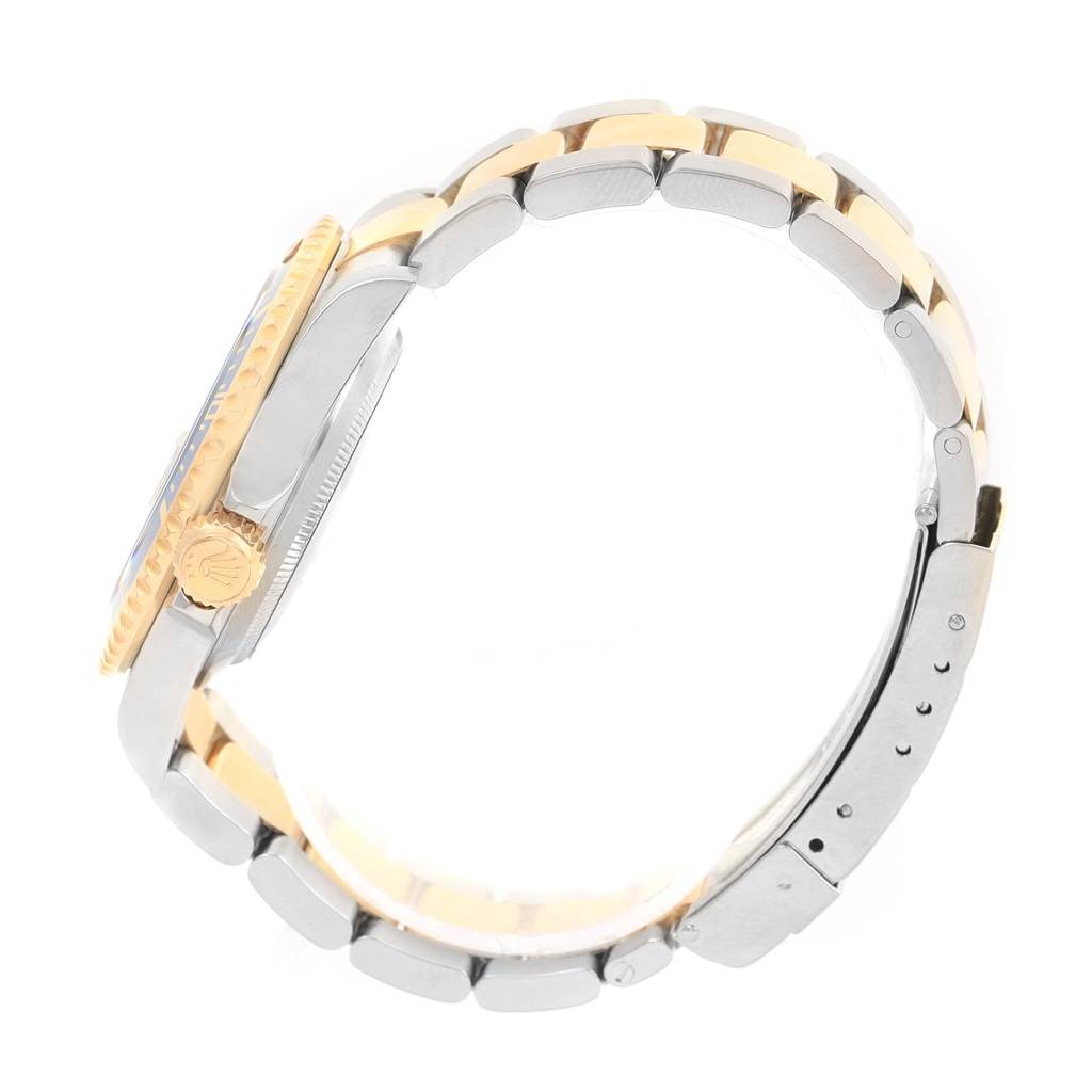 This image shows a side view of the Rolex Submariner 16613 Men's Steel and Gold (two tone) Blue Dial 16613 Men's Steel and Gold (two tone) Blue Dial watch, highlighting the case, bezel, crown, and bracelet.