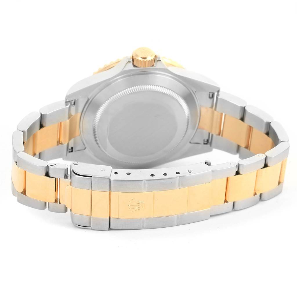 This image shows the back case and bracelet of a Rolex Submariner 16613 Men's Steel and Gold (two tone) Blue Dial 16613 Men's Steel and Gold (two tone) Blue Dial watch from a rear angle.