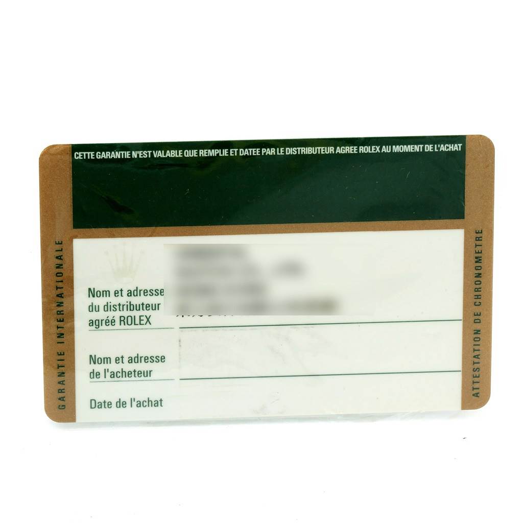 This image shows a warranty card for the Rolex Submariner 16613 Men's Steel and Gold (two tone) Black Dial 16613 Men's Steel and Gold (two tone) Black Dial watch, featuring spaces for the distributor and buyer's details.