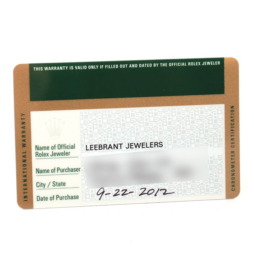 The image shows a warranty card for a Rolex Submariner 114060 Men's Stainless Steel Black Dial 114060 Men's Stainless Steel Black Dial, including details like the jeweler's name and purchase date.
