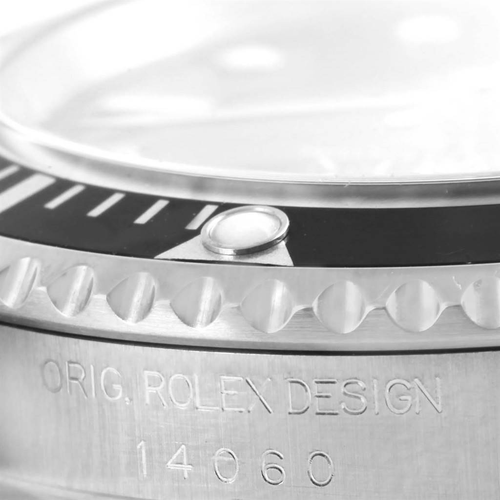The image shows a close-up of the bezel and casing of the Rolex Submariner 14060 Men's Stainless Steel Black Dial 14060 Men's Stainless Steel Black Dial, including the model number 14060.