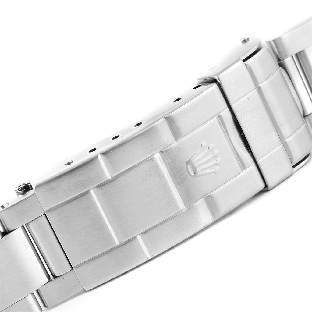 The image shows a close-up of the clasp on the bracelet of a Rolex Submariner 14060 Men's Stainless Steel Black Dial 14060 Men's Stainless Steel Black Dial watch.