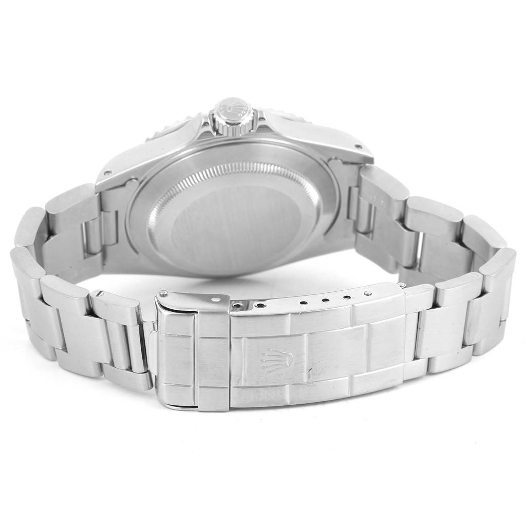 The image shows the back of a Rolex Submariner 14060 Men's Stainless Steel Black Dial 14060 Men's Stainless Steel Black Dial watch, highlighting the clasp, bracelet, and case back.