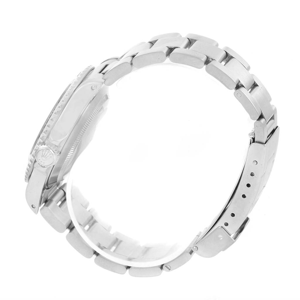 The image shows a side view of a Rolex Submariner 14060 Men's Stainless Steel Black Dial 14060 Men's Stainless Steel Black Dial watch, highlighting its bracelet and clasp.