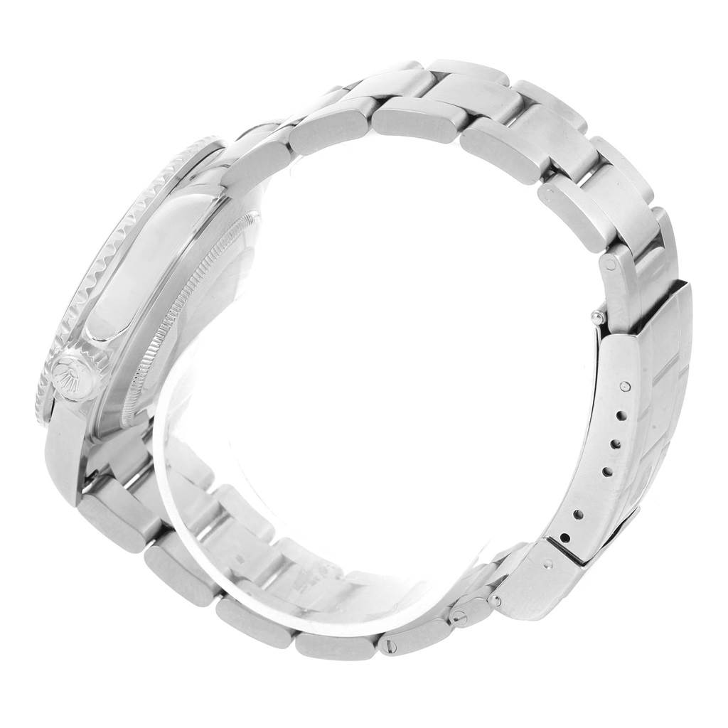 The photo shows a side view of the Rolex Submariner 16610 Men's Stainless Steel Black Dial 16610 Men's Stainless Steel Black Dial watch, highlighting its bracelet, clasp, and the side of its case.