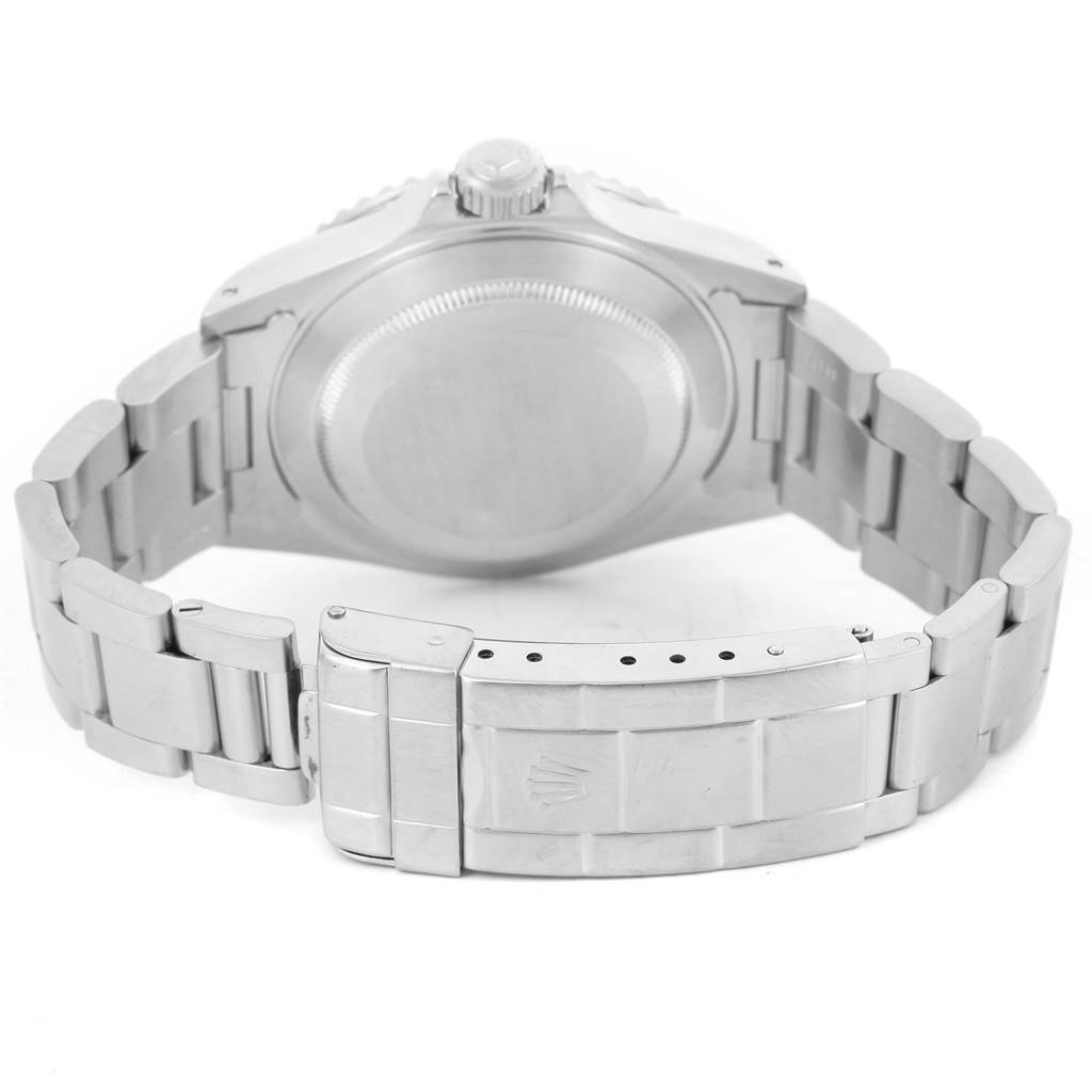 The image shows the back view of a Rolex Submariner 14060 Men's Stainless Steel Black Dial 14060 Men's Stainless Steel Black Dial, focusing on the case back and the closed bracelet clasp.