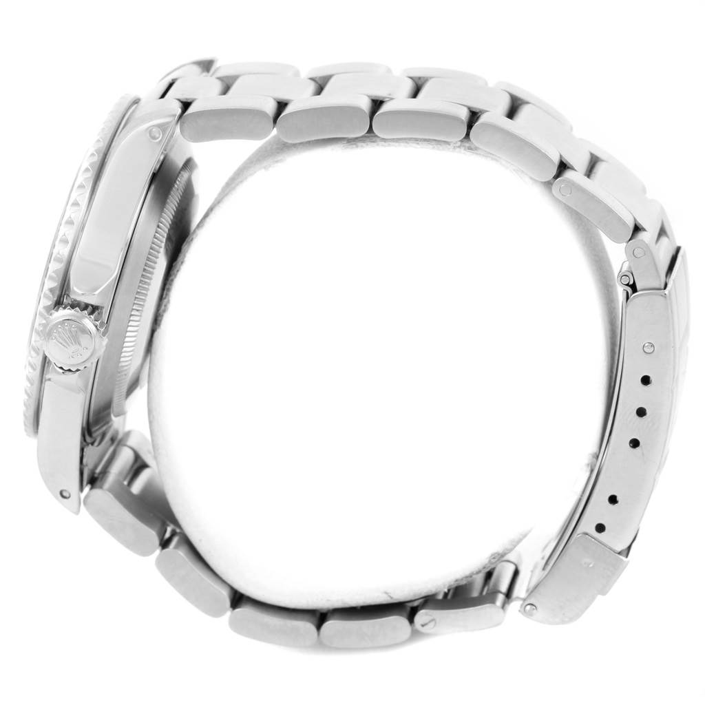 The image shows a side view of a Rolex Submariner 14060 Men's Stainless Steel Black Dial 14060 Men's Stainless Steel Black Dial watch, focusing on the bracelet, clasp, crown, and part of the case.