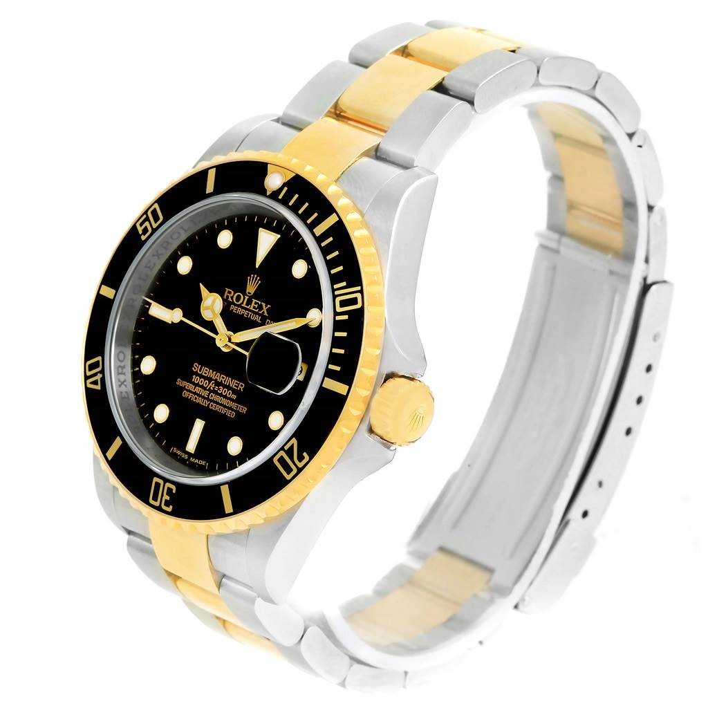 This image shows a angled view of a Rolex Submariner 16613 Men's Steel and Gold (two tone) Black Dial 16613 Men's Steel and Gold (two tone) Black Dial watch, displaying the face, bezel, and two-tone bracelet.
