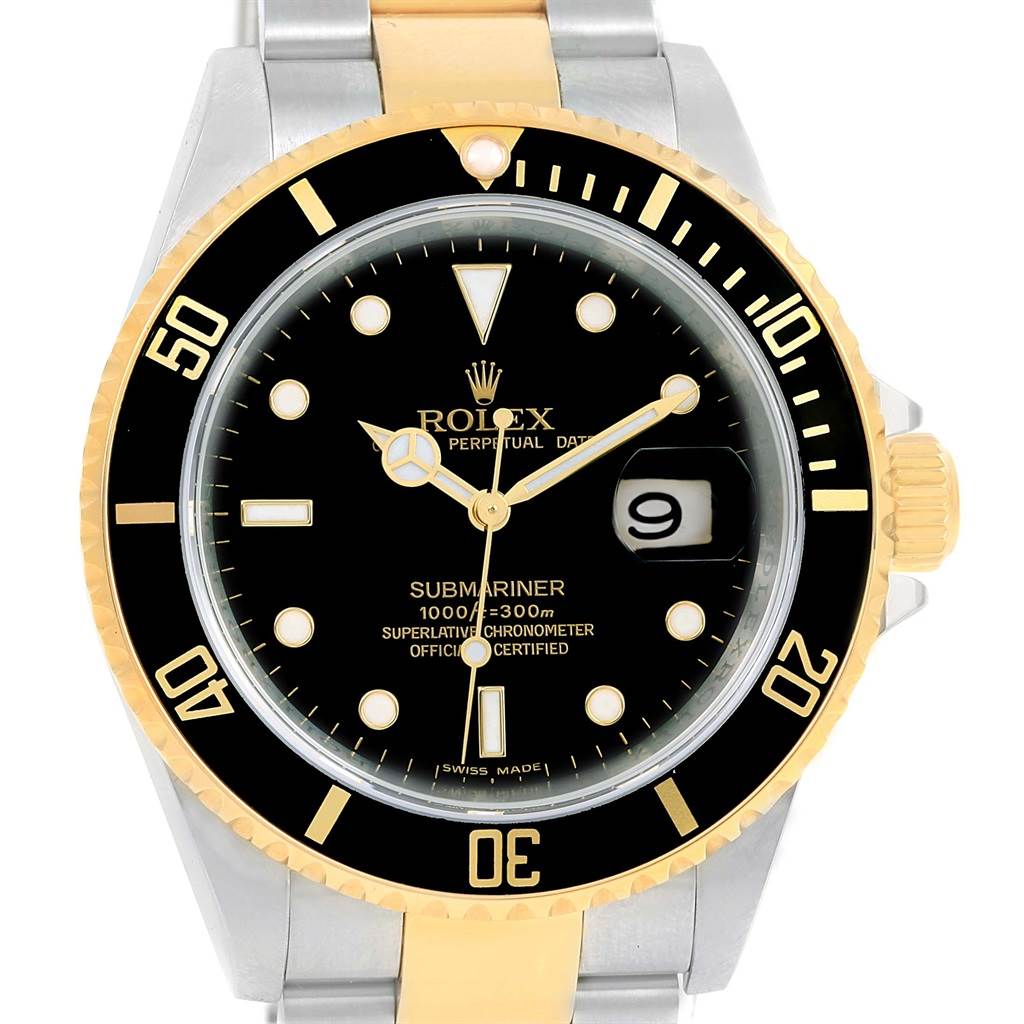 The image shows a front view of a Rolex Submariner 16613 Men's Steel and Gold (two tone) Black Dial 16613 Men's Steel and Gold (two tone) Black Dial watch, highlighting its black dial, bezel, and two-tone bracelet.