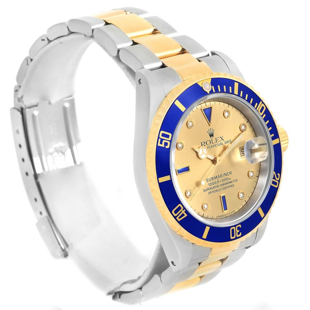 This image shows a Rolex Submariner 16613 Men's Steel and Gold (two tone) Champagne Dial 16613 Men's Steel and Gold (two tone) Champagne Dial watch angled slightly from the side, highlighting its blue bezel, gold face, and two-tone bracelet.