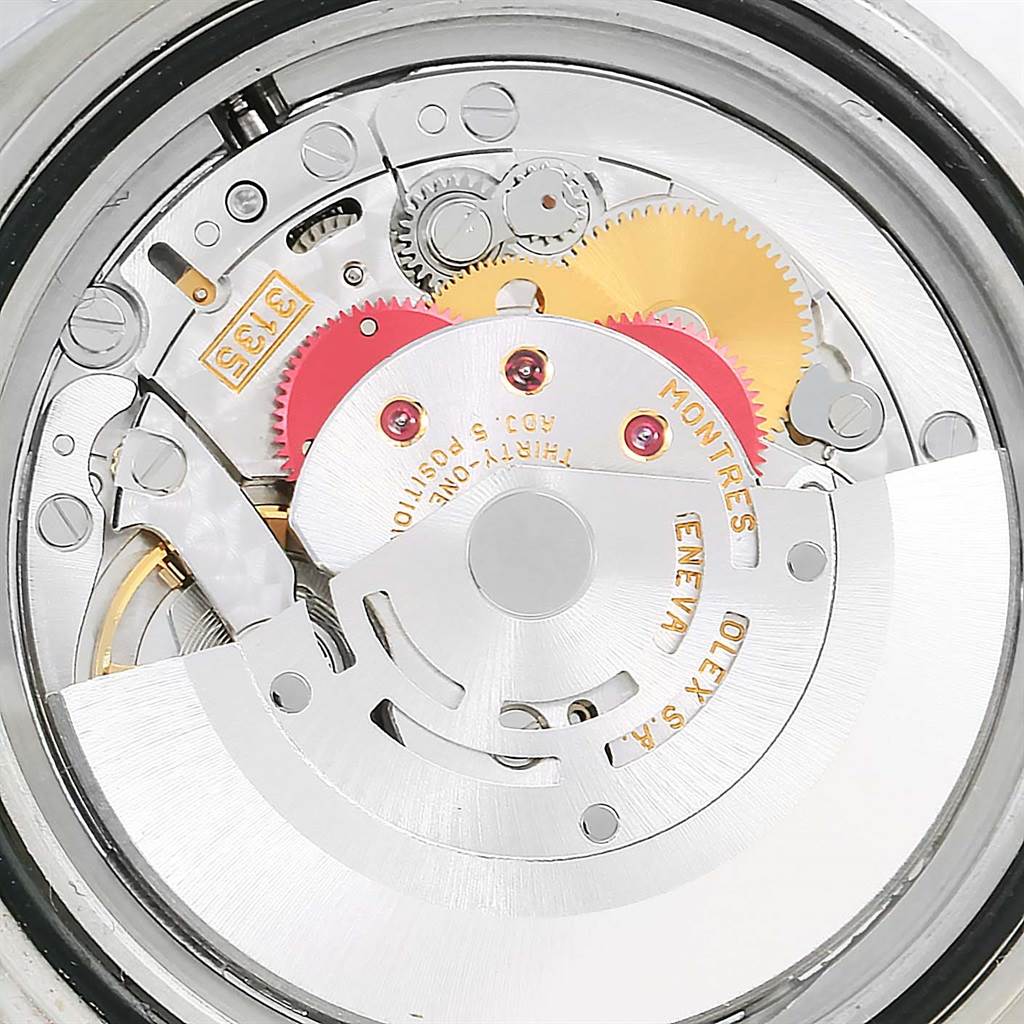 This image shows the internal mechanism and movement components of a Rolex Submariner 16610 Men's Stainless Steel Black Dial 16610 Men's Stainless Steel Black Dial watch from a top-down angle.