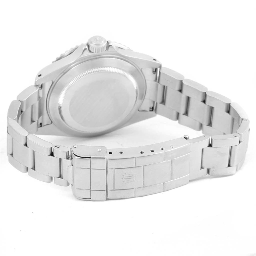 The image shows the back case and bracelet clasp of a Rolex Submariner 16610 Men's Stainless Steel Black Dial 16610 Men's Stainless Steel Black Dial watch from a rear angle.