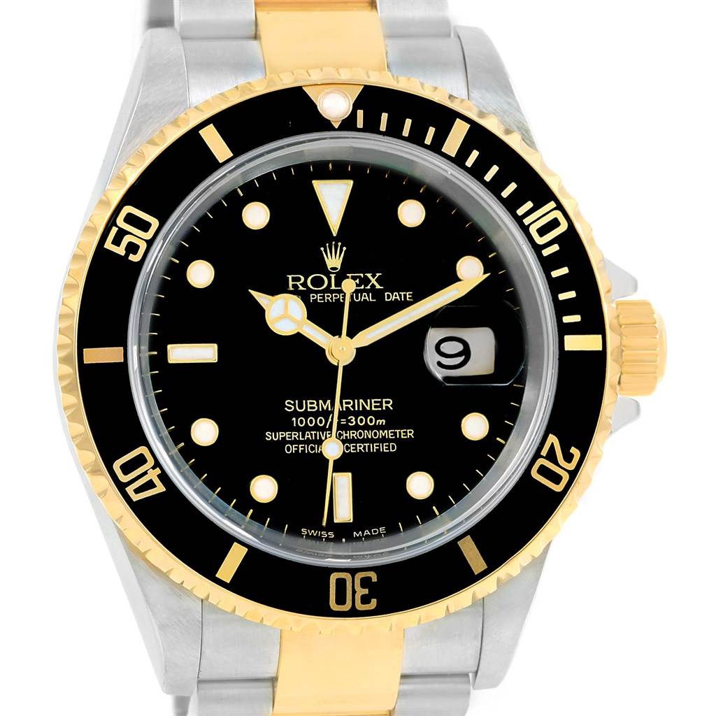 This image shows the front face and part of the bracelet of a Rolex Submariner 16613 Men's Steel and Gold (two tone) Black Dial 16613 Men's Steel and Gold (two tone) Black Dial watch.