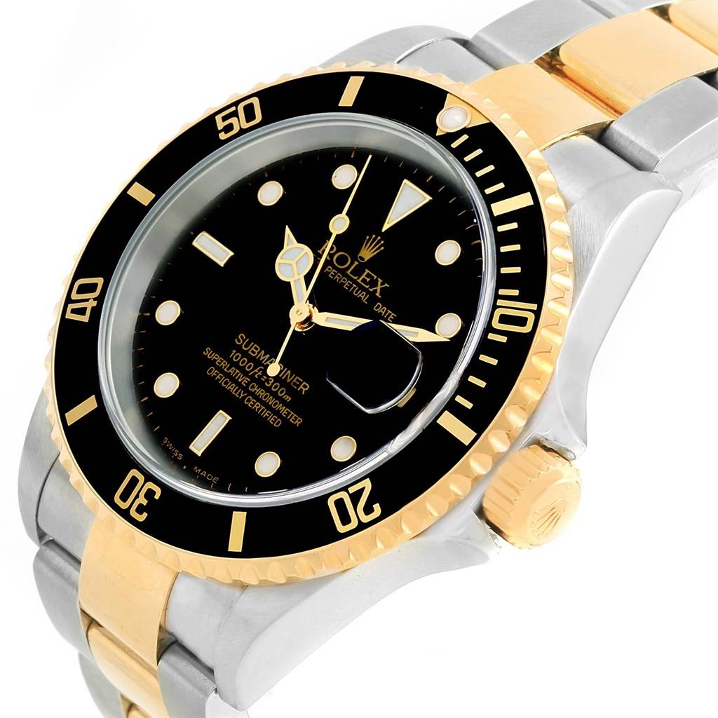 The image shows a close-up, angled view of a Rolex Submariner 16613 Men's Steel and Gold (two tone) Black Dial 16613 Men's Steel and Gold (two tone) Black Dial watch, displaying its two-tone band, bezel, dial, and crown.
