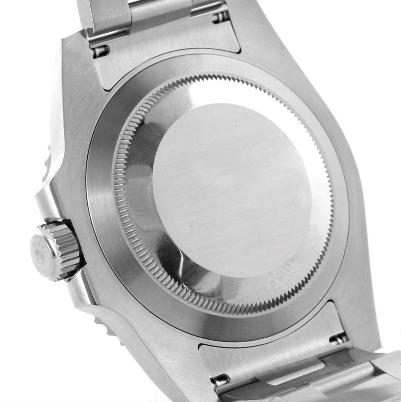 This image shows the back case and crown of a Rolex Submariner 116610LV Men's Stainless Steel Green Dial 116610LV Men's Stainless Steel Green Dial watch from a rear angle.