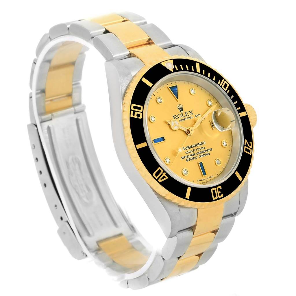 This image shows a side-angle view of a Rolex Submariner 16613 Men's Steel and Gold (two tone) Champagne Dial 16613 Men's Steel and Gold (two tone) Champagne Dial watch, emphasizing the bezel, dial, and two-tone bracelet.