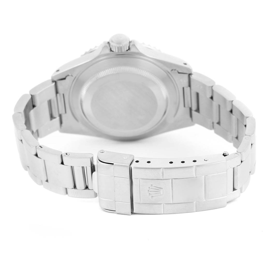 The image shows the back case and bracelet of a Rolex Submariner 14060 Men's Stainless Steel Black Dial 14060 Men's Stainless Steel Black Dial watch from a rear angle.