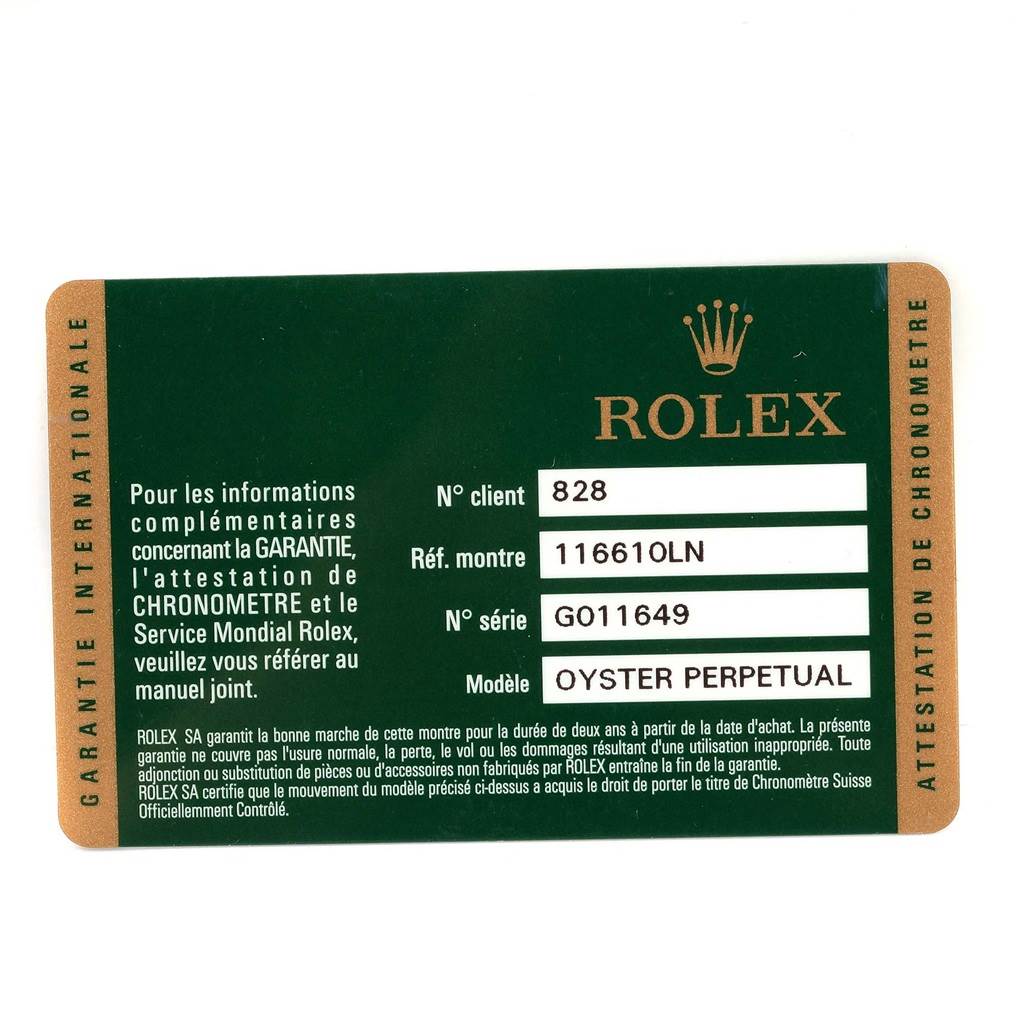 This image shows a Rolex warranty card for the Submariner model, featuring details like reference and serial numbers.