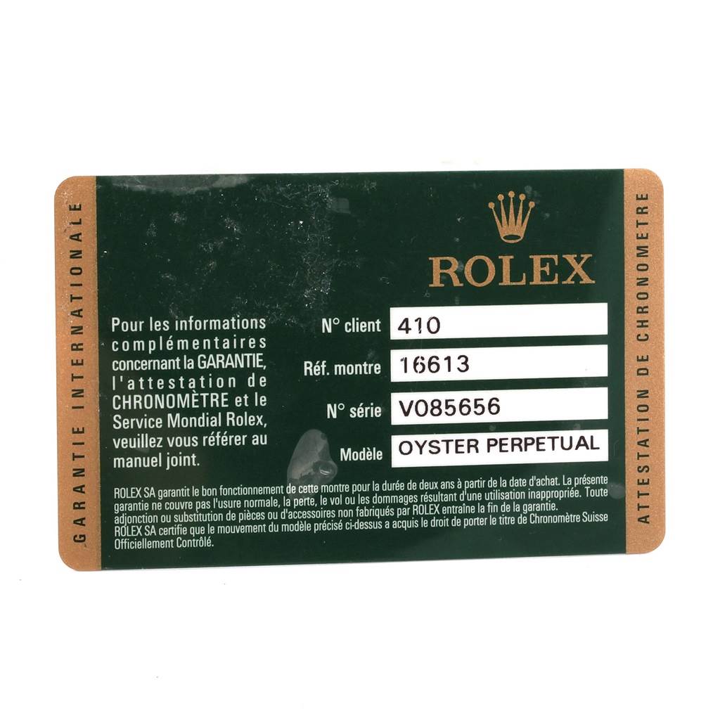 This image shows the warranty card for a Rolex Submariner 16613 Men
s Steel and Gold (two tone) Blue Dial 16613 Men
s Steel and Gold (two tone) Blue Dial model number 16613.