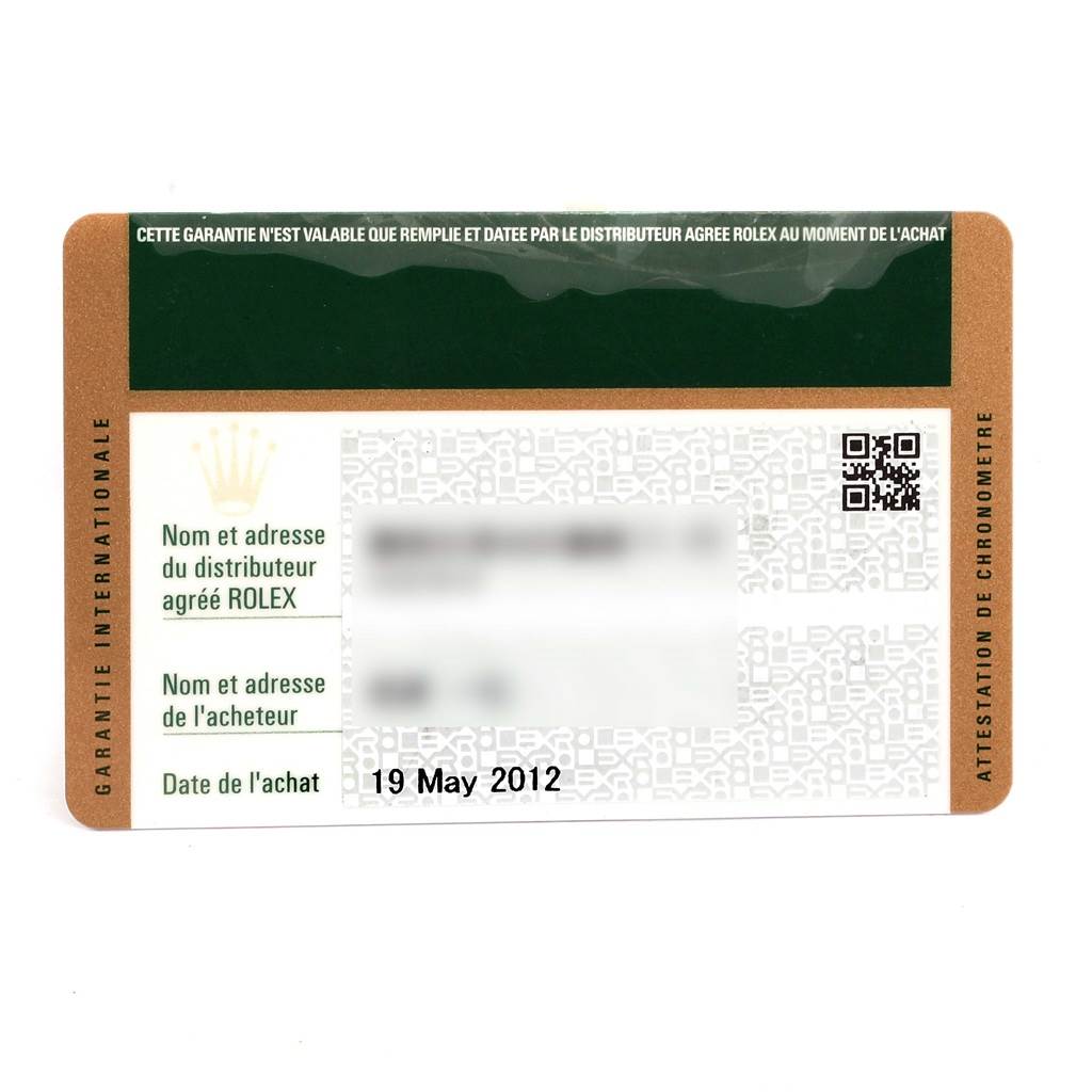 This image shows the international warranty card for the Rolex Submariner 16613 Men
s Steel and Gold (two tone) Blue Dial 16613 Men
s Steel and Gold (two tone) Blue Dial, featuring purchase and distributor details.