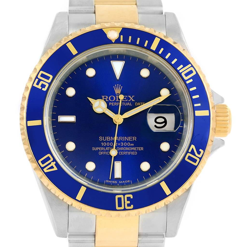 The Rolex Submariner 16613 Men
s Steel and Gold (two tone) Blue Dial 16613 Men
s Steel and Gold (two tone) Blue Dial watch is shown from a front angle, highlighting its blue dial, gold bezel, and bracelet.