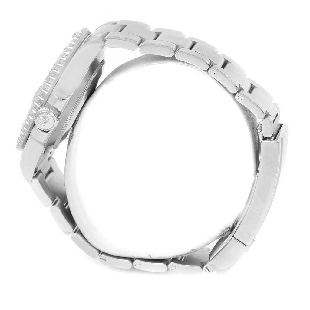 The image shows a side view of a Rolex Submariner 116610LV Men
s Stainless Steel Green Dial 116610LV Men
s Stainless Steel Green Dial, highlighting the watch case, crown, and bracelet links.