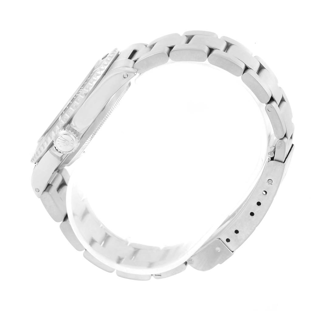 This image shows a side view of the Rolex Submariner 14060 Men
s Stainless Steel Black Dial 14060 Men
s Stainless Steel Black Dial watch, highlighting the bracelet, case, crown, and clasp.