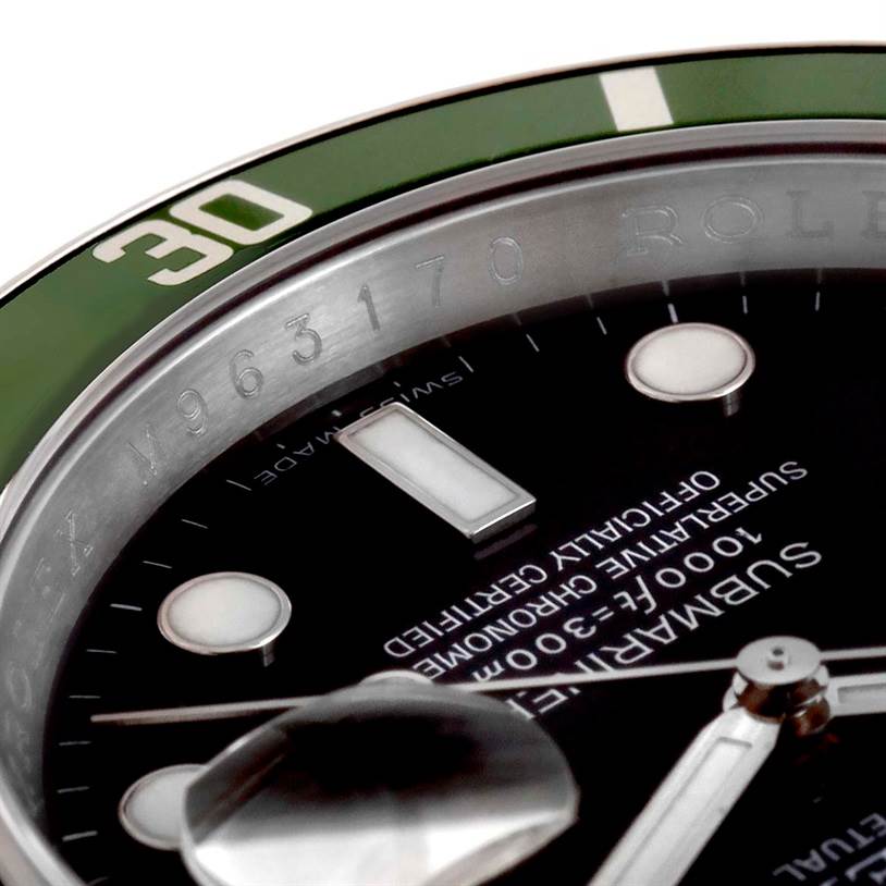 The image shows a close-up angled view of the bezel, dial, and hands of a Rolex Submariner 16610LV Men
s Stainless Steel Black Dial 16610LV Men
s Stainless Steel Black Dial watch.