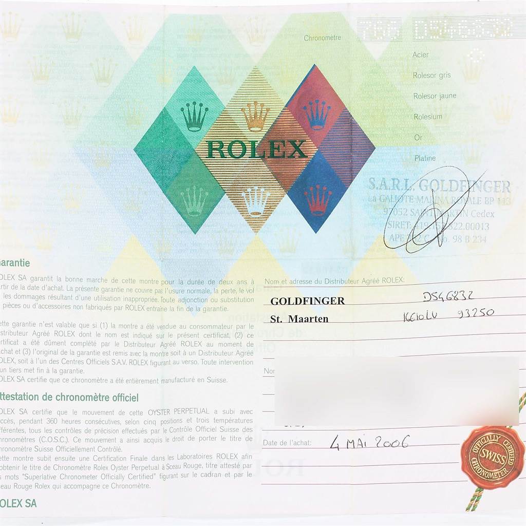 The image shows the warranty card and official documents for the Rolex Submariner 16610LV Men
s Stainless Steel Black Dial 16610LV Men
s Stainless Steel Black Dial model.