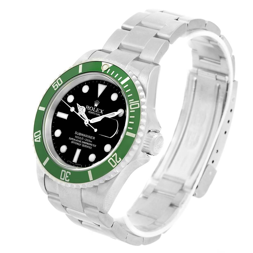 The image shows a side angle of a Rolex Submariner 16610LV Men
s Stainless Steel Black Dial 16610LV Men
s Stainless Steel Black Dial watch, highlighting its green bezel, black dial, and stainless steel bracelet.