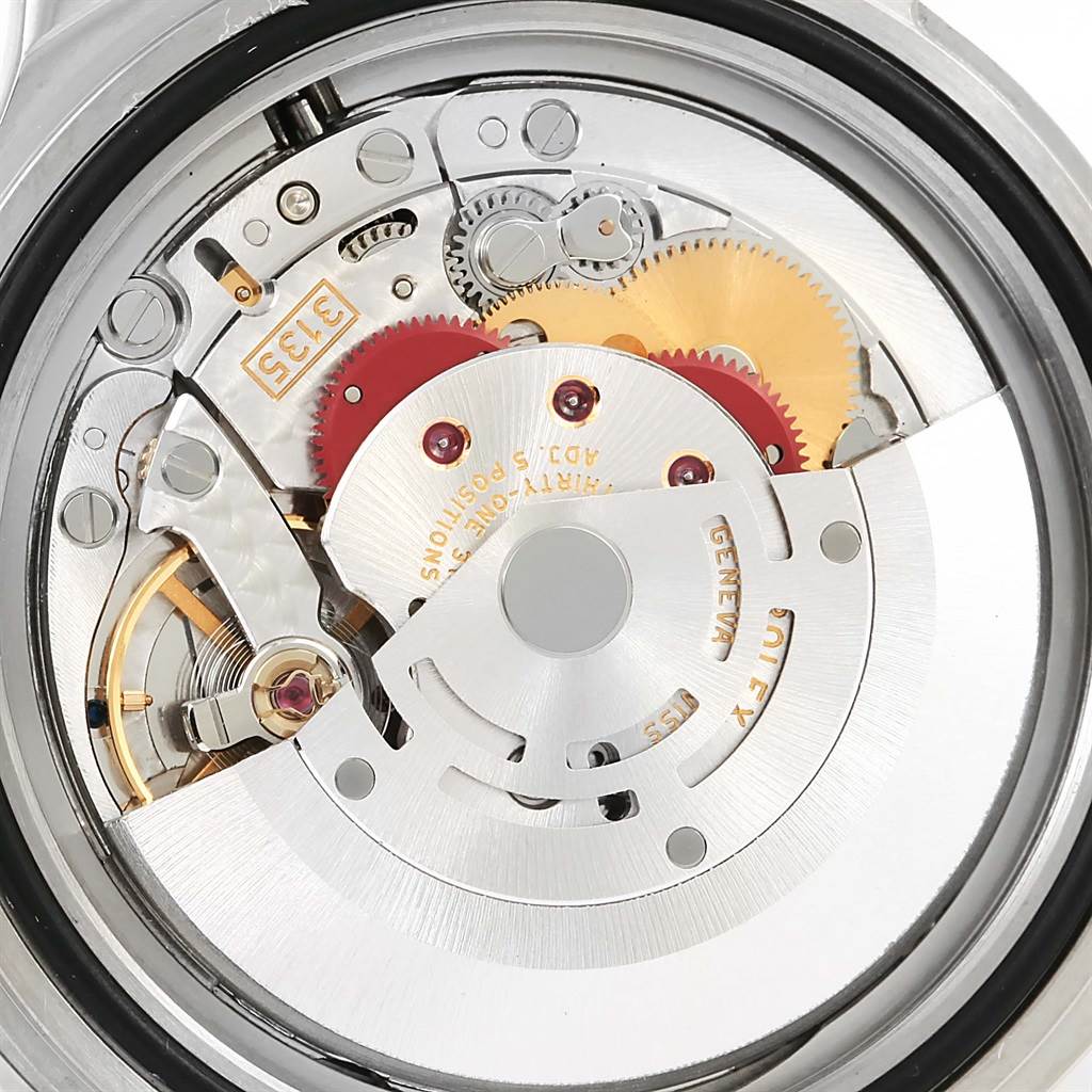 The image shows the internal mechanical movement of a Rolex Submariner 16610LV Men
s Stainless Steel Black Dial 16610LV Men
s Stainless Steel Black Dial watch viewed from the back.