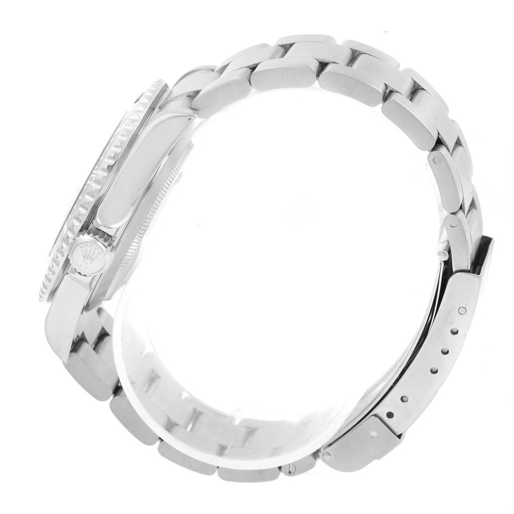 This image shows a side view of the Rolex Submariner 16610 Men
s Stainless Steel Black Dial 16610 Men
s Stainless Steel Black Dial watch, highlighting the bracelet, bezel, and crown.